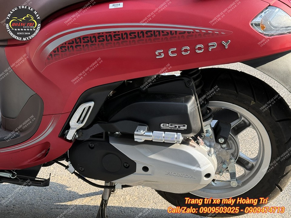 Gác chân phụ xe Scoopy