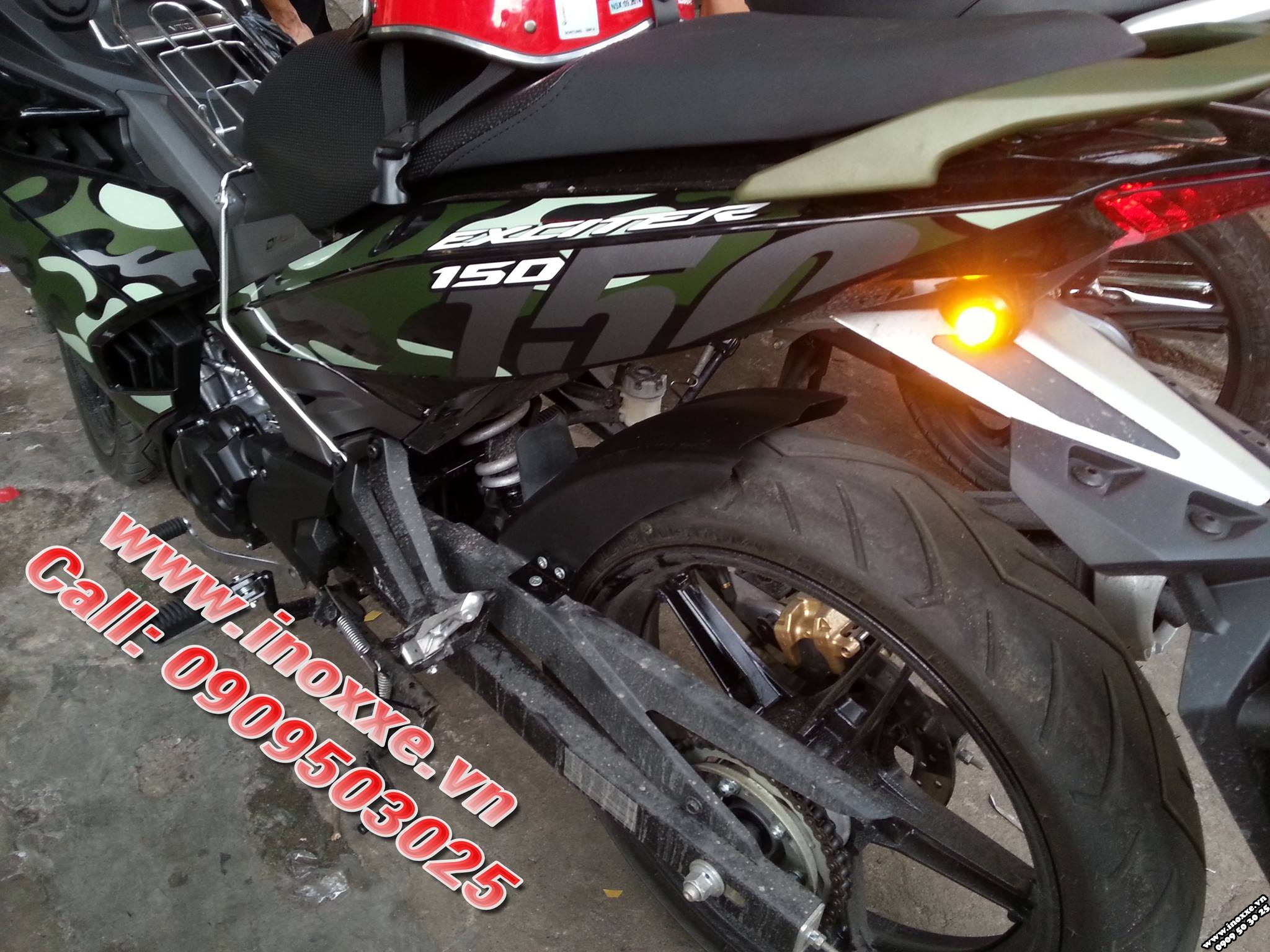 Đồ chơi Exciter 150 - Xi nhan nút áo Rizoma